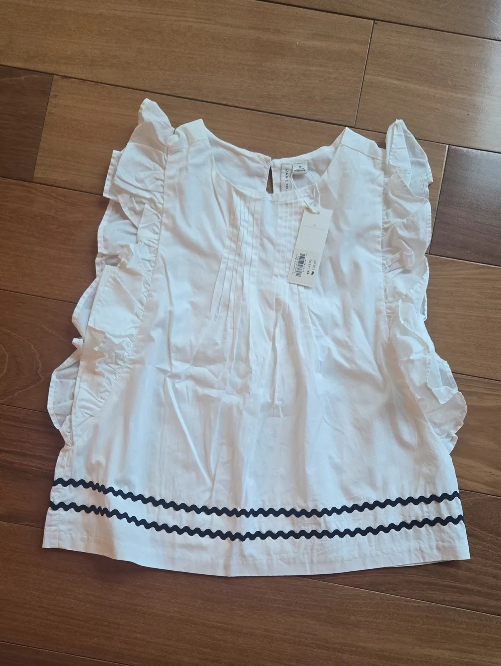 Janue And Jack Girls White Ruffle Trim Sleeveless Top with Navy Accent